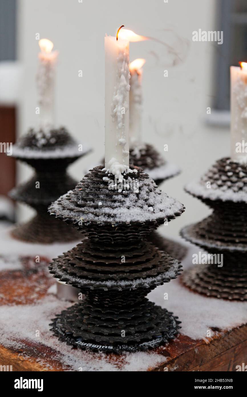 Umea, Norrland Sweden - December 11, 2021: candlesticks made from used bicycle cassettes Stock Photo