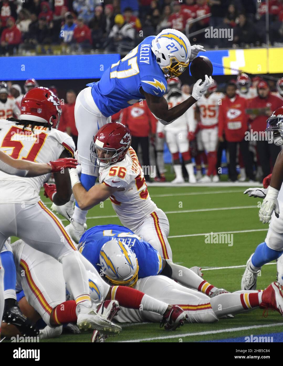 Inglewood, USA. 17th Dec, 2021. Los Angeles Chargers Joshua Kelley fumbles short of the goal line while being tackled by Kansas City Chiefs linebacker Ben Riemann (56) at SoFi Stadium on Thursday, December 16, 2021 in Inglewood, California. The Chiefs defeated the Chargers 34-28. Photo by Jon SooHoo/UPI Credit: UPI/Alamy Live News Stock Photo