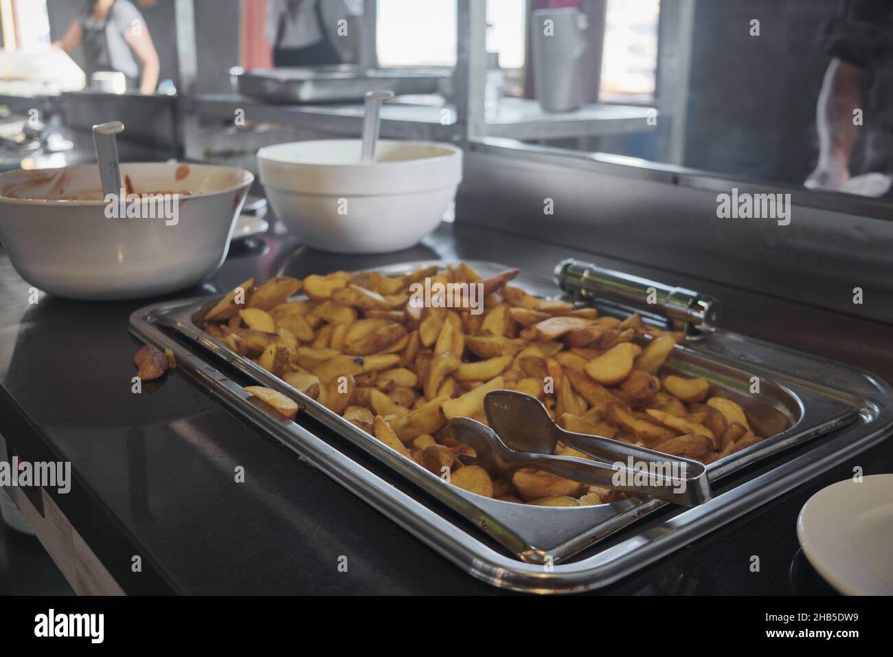 Deepfried potato slices Stock Photo Alamy