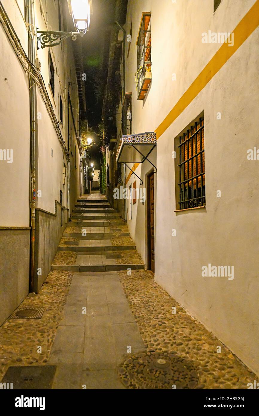 Typical and narrow street of the Albaicin neighborhood Stock Photo