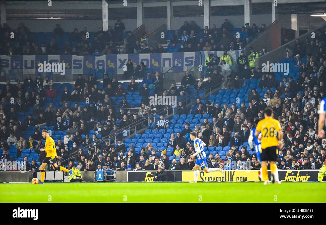 A few empty seats in the stands due to Covid-19 pandemic during the  Premier League match between Brighton and Hove Albion and Wolverhampton Wanderers  at The American Express Community Stadium  , Brighton,  UK - 15th December 2021 - Editorial use only. No merchandising. For Football images FA and Premier League restrictions apply inc. no internet/mobile usage without FAPL license - for details contact Football Dataco Stock Photo