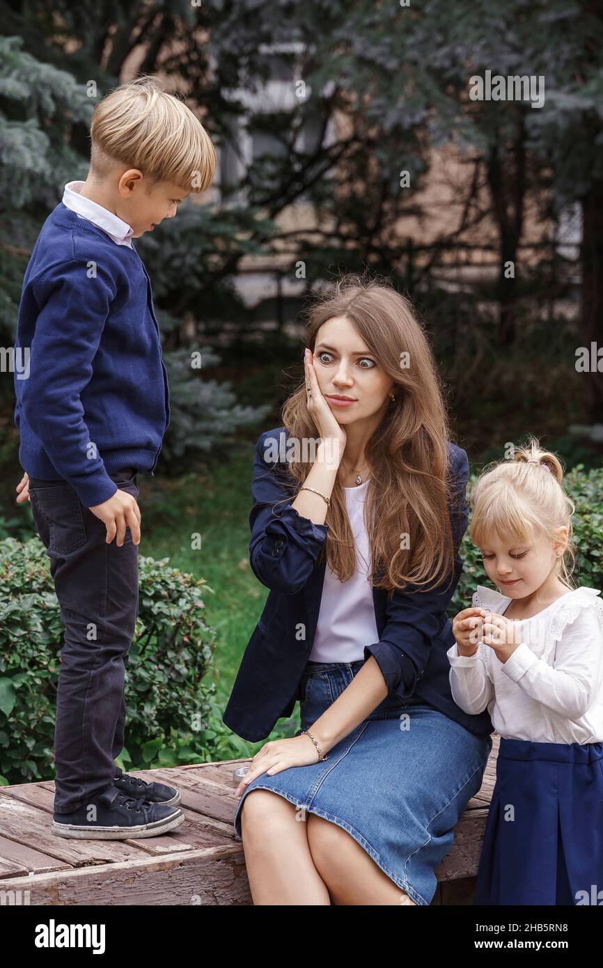 Upset caucasian woman having parenting problems, depression, parenting difficulties Stock Photo