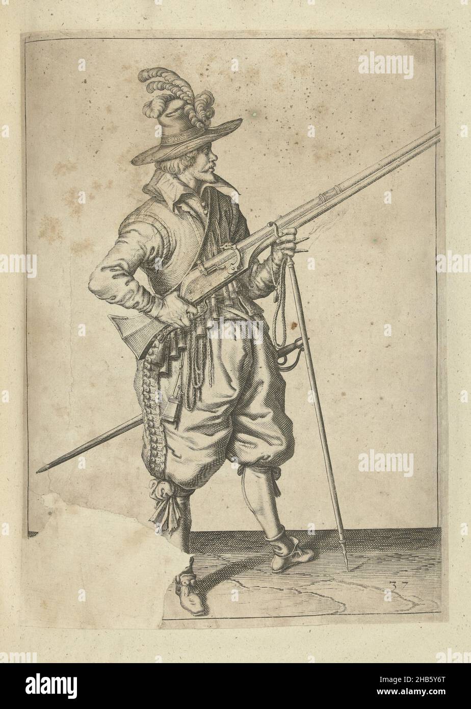 Soldier on guard holding his musket by his right side angled upward, his finger on the trigger (no. 37), ca. 1600, A soldier on guard, full-length, to the right, holding a musket (a particular type of firearm) by his right side, his right index finger on the trigger, his left hand around the fork of the furket (musket fork) on which the barrel rests, angled upward (no. 37), ca. 1600. In his left hand also a burning fuse. Plate 37 in the instructions for handling the musket: Shortest instruction for the figures, so much concerneth the right use of muskett. Part of the illustrations in an Stock Photo