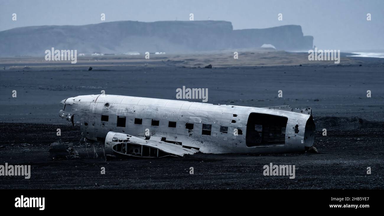 Wreck of and airplane in Iceland against Vik landscape Stock Photo
