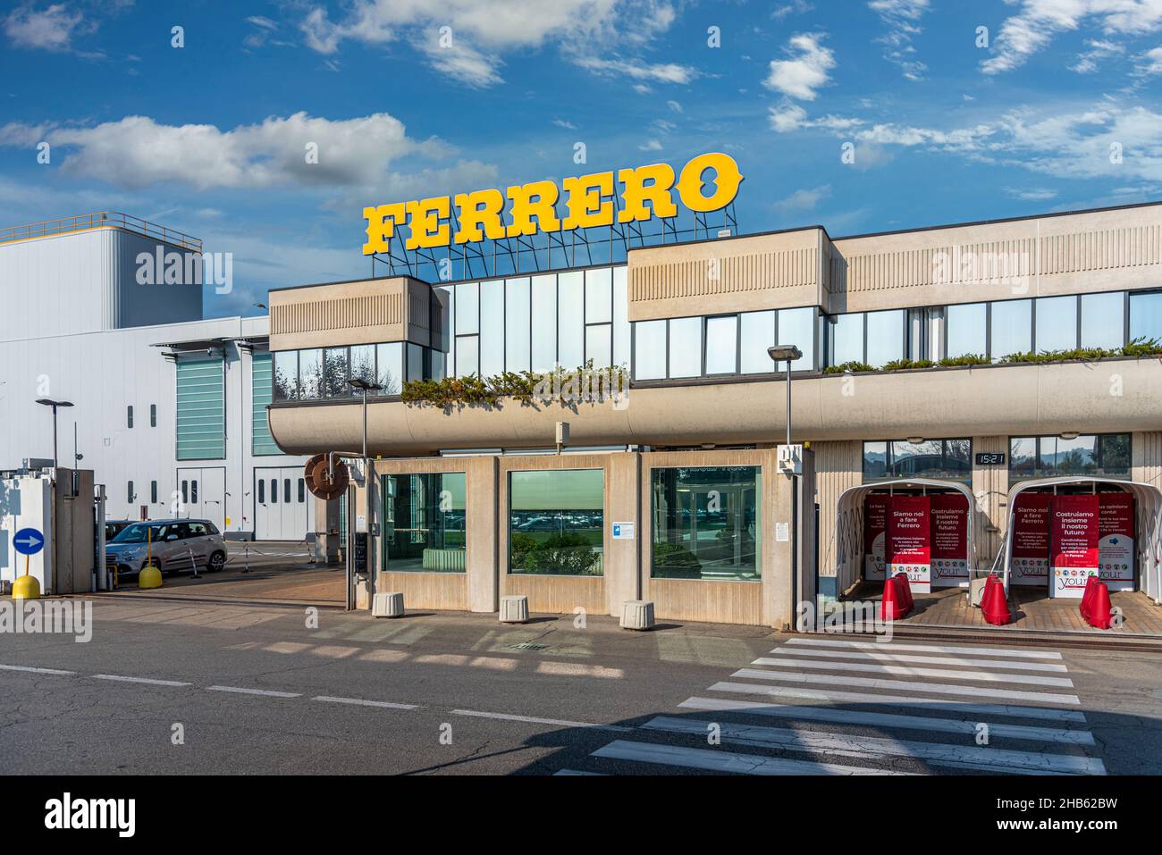 Alba, Cuneo, Italy - October 12, 2021: main entrance to the Ferrero factory building in via Vivaro, it is famous confectionery factory Stock Photo