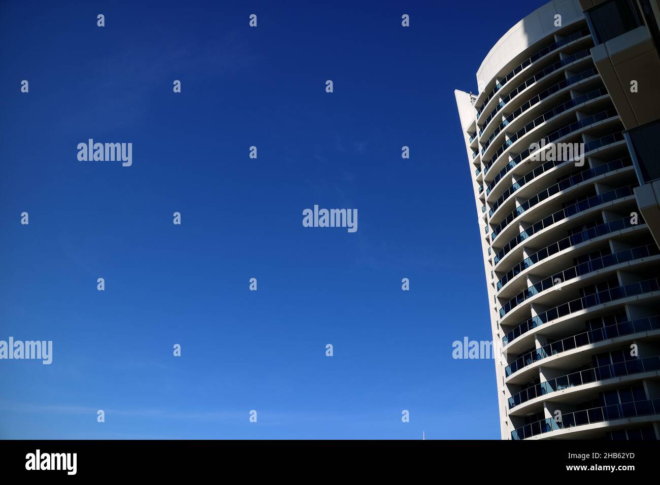 Skyscraper silhouette against blue sky in Gold Coast Australia Stock Photo