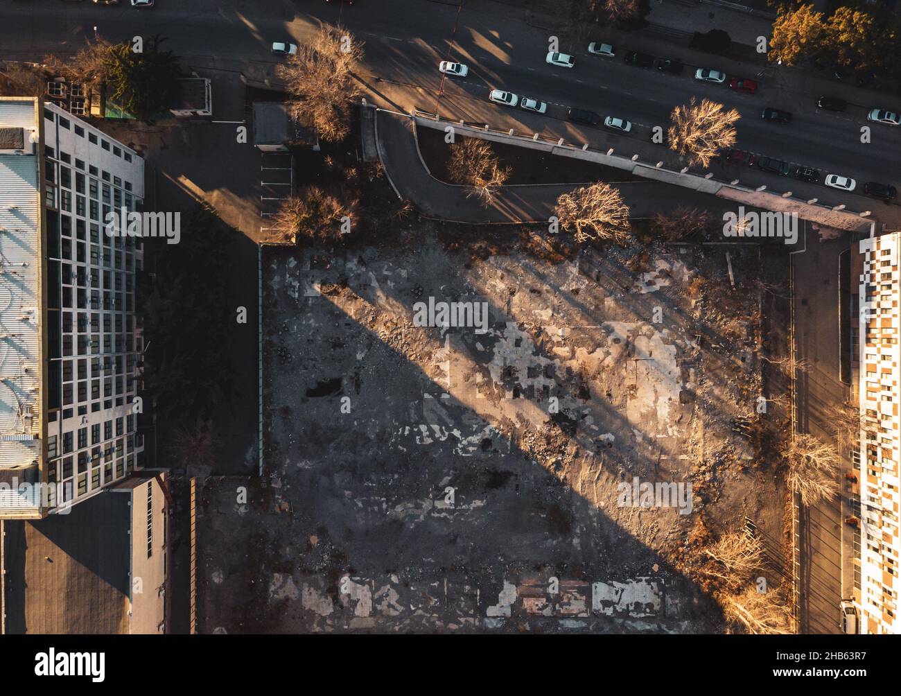 Aerial view of empty field surrounded by buildings. Blank space property banner background Stock Photo