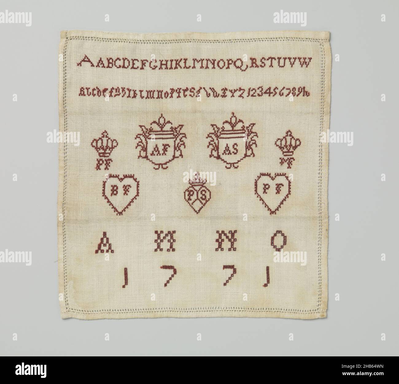 Linen sampler on which is embroidered with silk two alphabets (printing