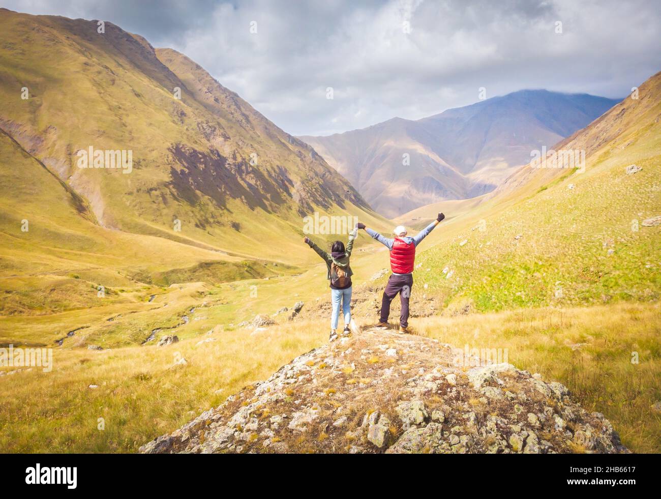 Successful woman hiker hands up hi-res stock photography and images - Alamy