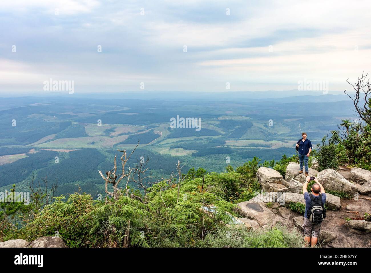 Hikers at God's Window viewpoint alongside the panorama route, Mpumalanga, South Africa Stock Photo