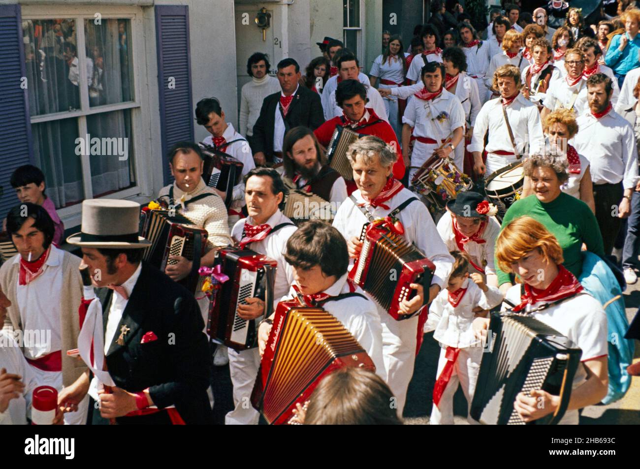 Obby Horse May Day festival, Padstow, Cornwall, England, UK 1975 - The Old 'Oss MC and band Stock Photo