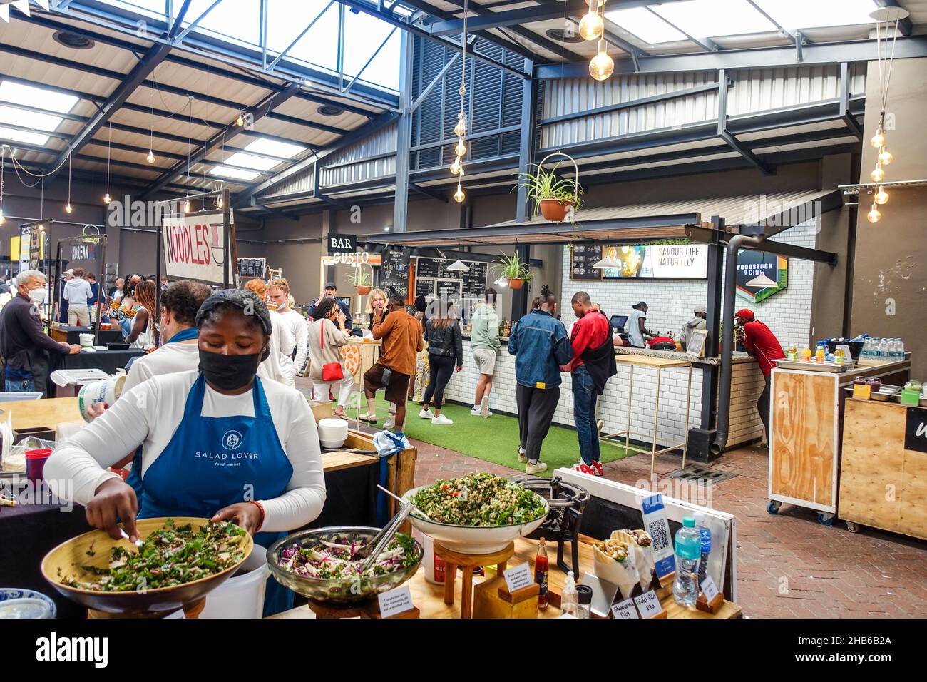 Food stalls at the Neighbourgoods market in Cape Town, South Africa Stock Photo