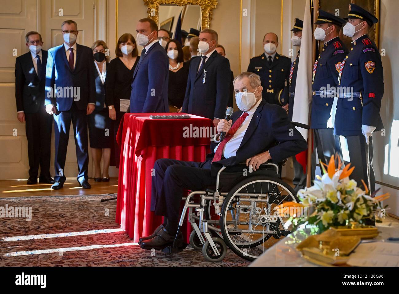 Lany, Czech Republic. 17th Dec, 2021. Czech President Milos Zeman, in the wheelchair, appointed ministers of new Czech cabinet of Petr Fiala, comprising five parties - ODS, KDU-CSL, TOP 09, Pirates and STAN, on December 17, 2021, at the Lany Chateau, Czech Republic. Credit: Vit Simanek/CTK Photo/Alamy Live News Stock Photo