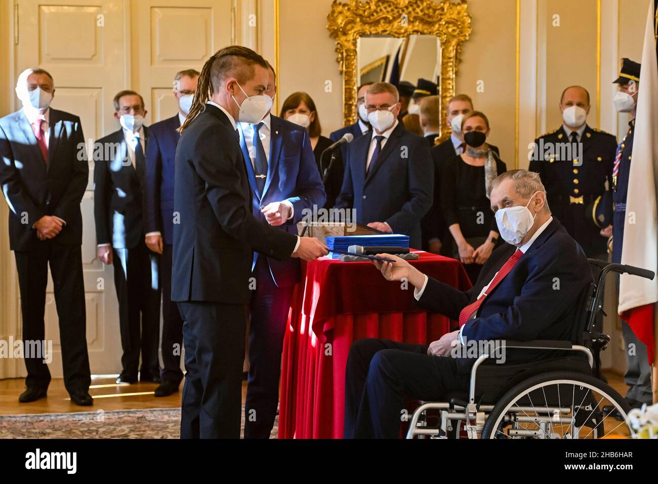 Lany, Czech Republic. 17th Dec, 2021. Czech President Milos Zeman, right, appointed ministers of new Czech cabinet of Petr Fiala, comprising five parties - ODS, KDU-CSL, TOP 09, Pirates and STAN, on December 17, 2021, at the Lany Chateau, Czech Republic. On the photo is seen new Regional Development Minister Ivan Bartos (Pirates), left. Credit: Vit Simanek/CTK Photo/Alamy Live News Stock Photo