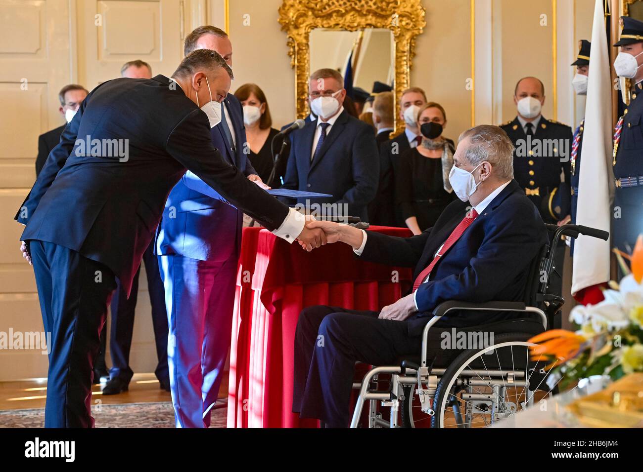 Lany, Czech Republic. 17th Dec, 2021. Czech President Milos Zeman, right, appointed ministers of new Czech cabinet of Petr Fiala, comprising five parties - ODS, KDU-CSL, TOP 09, Pirates and STAN, on December 17, 2021, at the Lany Chateau, Czech Republic. On the photo is seen new Industry and Trade Minister Jozef Sikela (for STAN), left. Credit: Vit Simanek/CTK Photo/Alamy Live News Stock Photo