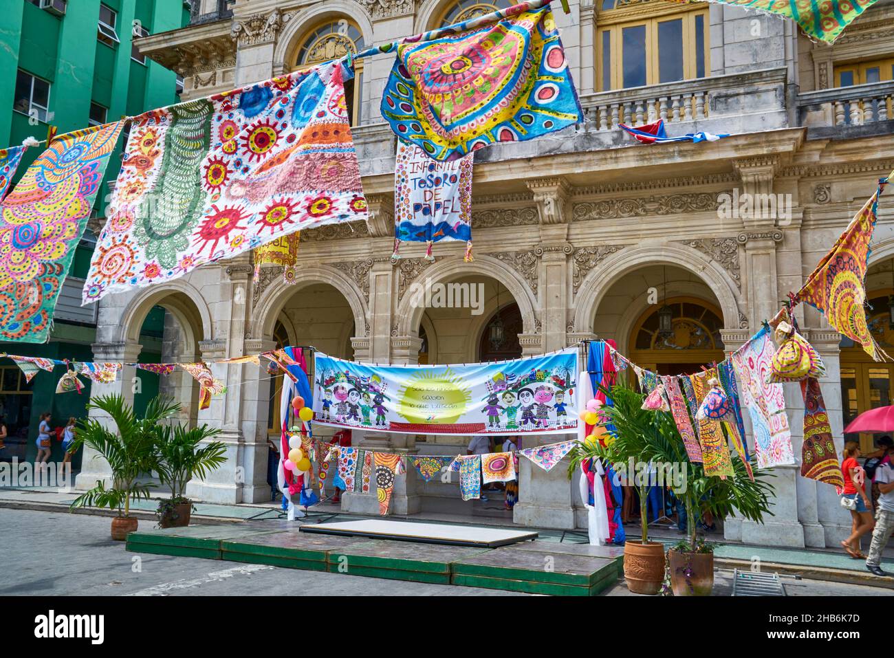 colourfull banners advertise for a cultural festival for chilfran at the Casa de la Cultura in Santa Clara, Cuba, Santa Clara, Villa Clara Stock Photo