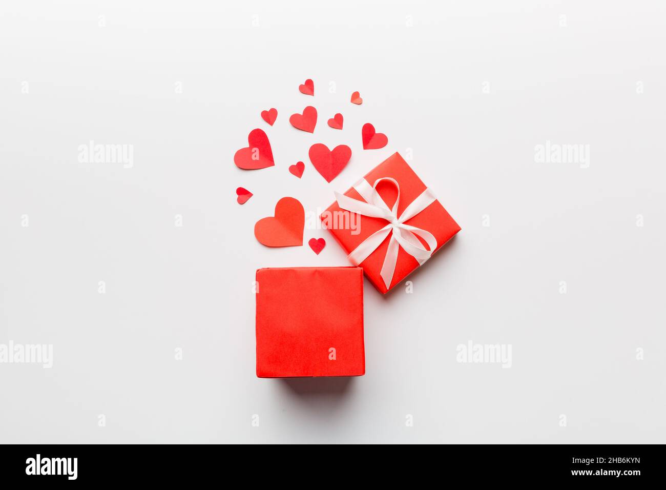 Happy valentines day opened heart shape gift box with small hearts, on ...