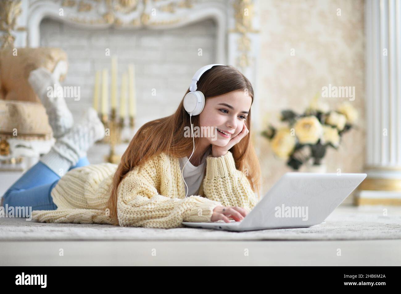Portrait of beautiful teen girl lying on floor Stock Photo - Alamy