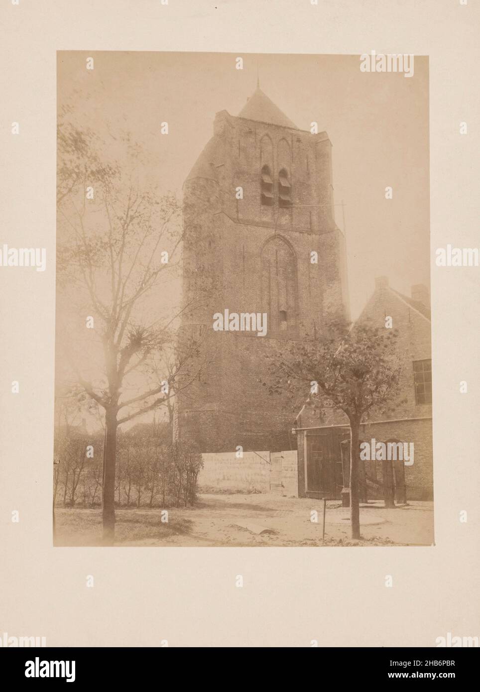 Church tower at Ouwerkerk, anoniem (Monumentenzorg) (attributed to), Ouwerkerk, 1897, photographic support, cardboard, albumen print, height 232 mm × width 177 mm Stock Photo