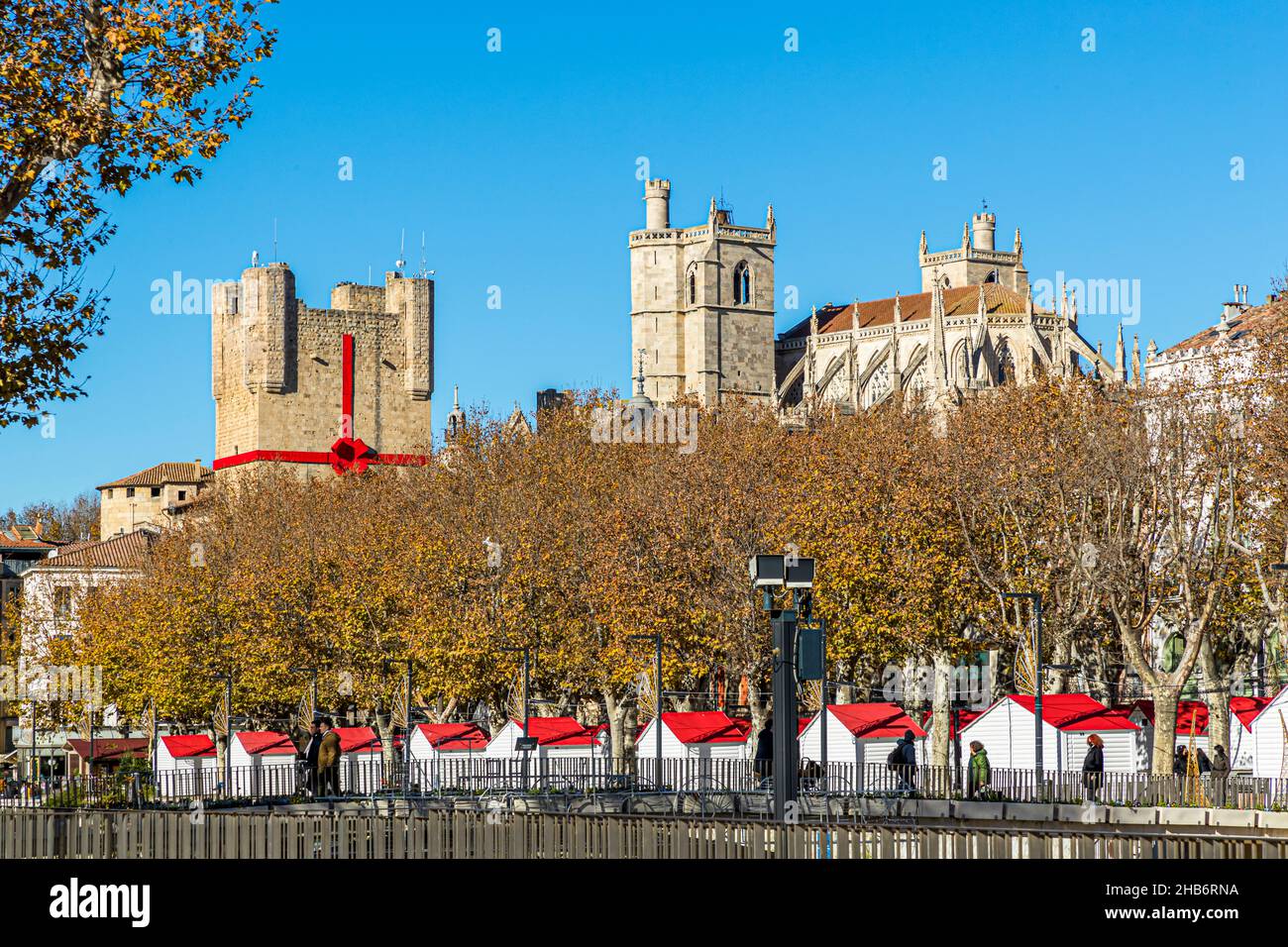 Christmas decorated town hall and huts of the Christmas market of Narbonne, France Stock Photo