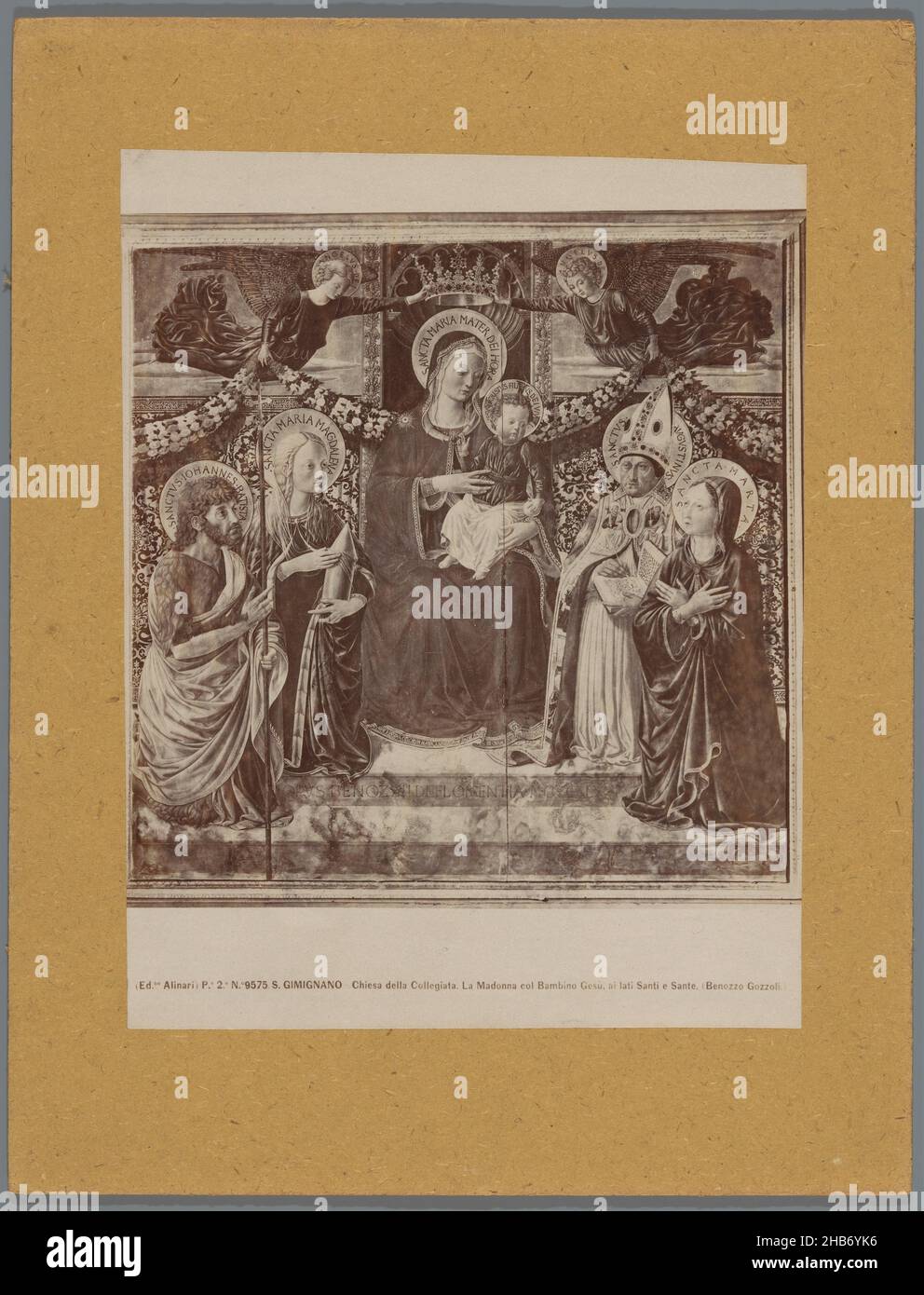 Photoreproduction of a painting by B. Gozzoli, depicting Mary with Child between Saints and Angels, S. GIMIGNANO Chiesa della Collegiata. La Madonna col Bambino Gesù, ai lati Santi e Sante. (title on object), Alinari (mentioned on object), after: Benozzo Gozzoli (mentioned on object), Collegiata Santa Maria Assuntaafter: Italy, c. 1875 - c. 1900, cardboard, albumen print, height 247 mm × width 190 mm Stock Photo