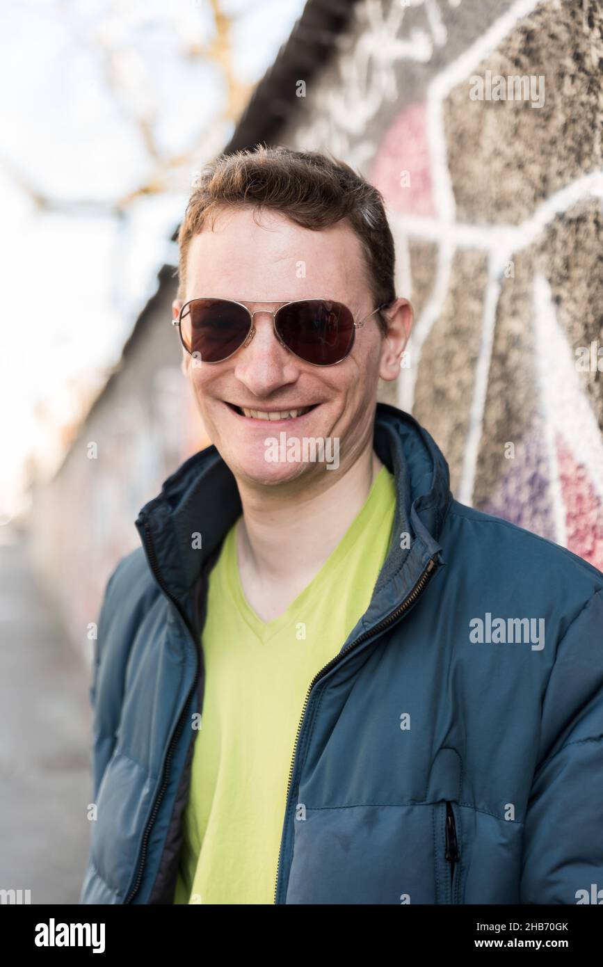 Portrait of a 40 year old white male tourist with sunglasses Stock