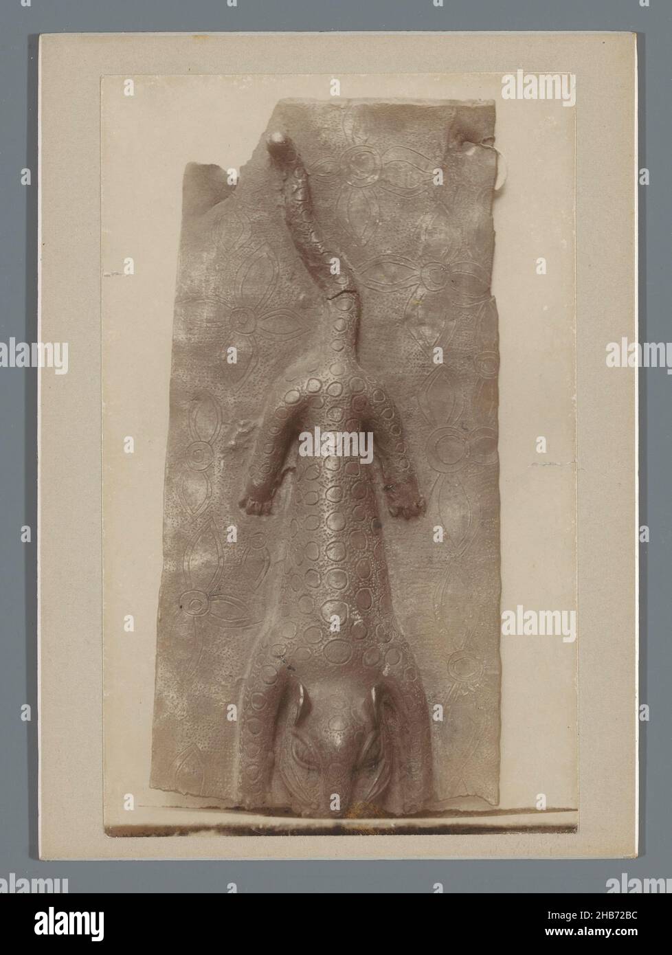 Bronze statue of an animal, possibly a leopard from Benin, anonymous, 1880 - 1940, baryta paper, cardboard, height 179 mm × width 130 mm Stock Photo