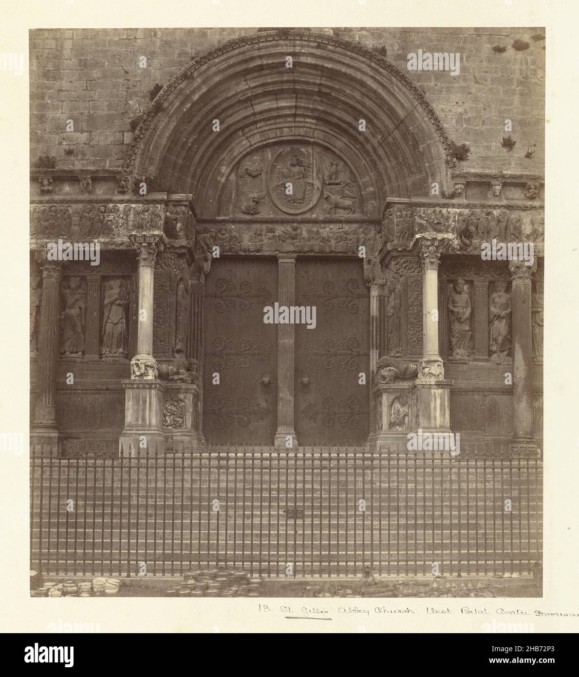 West portal of the abbey church of Saint-Gilles-du-Gard, St. Gilles Abbey Church, West Portal, Centre Doorway (title on object), anonymous, publisher: Downes & Co. Cundall (mentioned on object), Saint-Gilles-du-Gard, publisher: London, 1863 - 1865, paper, cardboard, albumen print, height 264 mm × width 238 mmheight 480 mm × width 380 mm Stock Photo