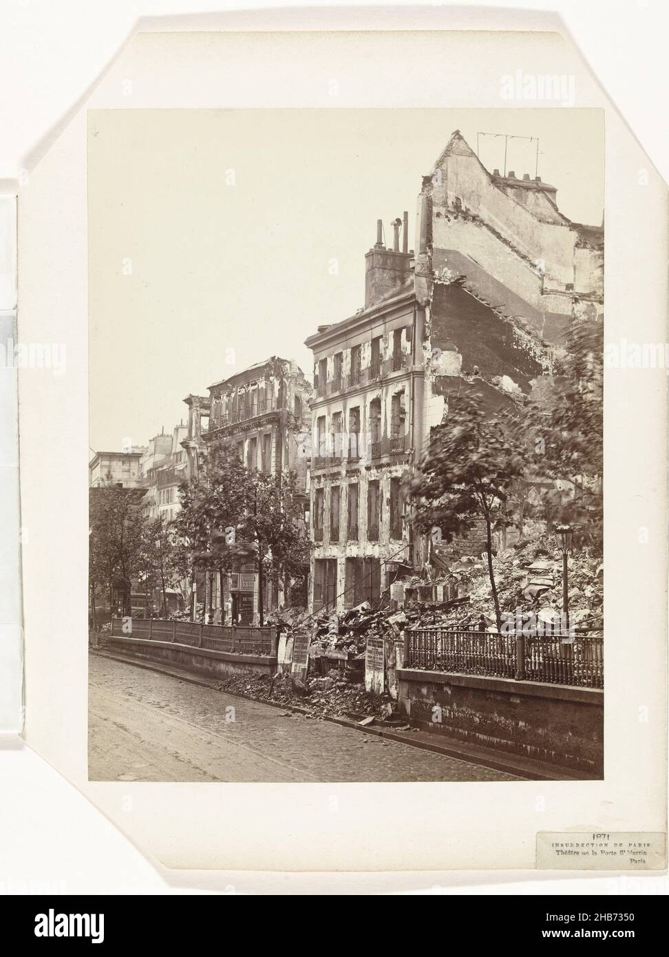 View of the Théâtre de la Porte Saint-Martin in Paris, destroyed during fighting between government troops and communards, Théâtre de la Porte St Martin, Paris (title on object), Insurrection de Paris (series title on object), anonymous, Paris, 1871, paper, cardboard, albumen print, height 252 mm × width 194 mmheight 312 mm × width 244 mm Stock Photo