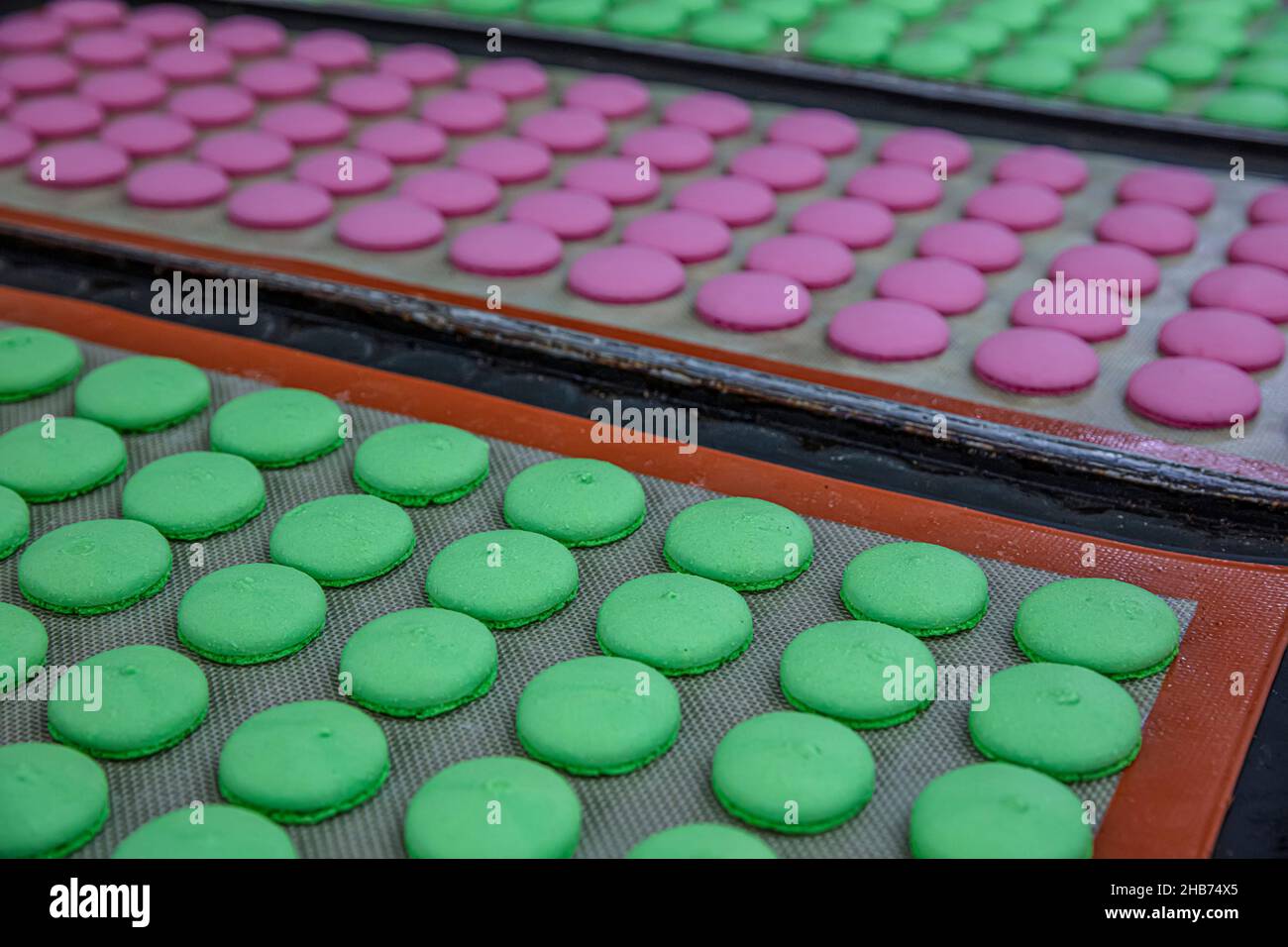 Production of macarons. Preparation of pink dough. Pink Buttercream