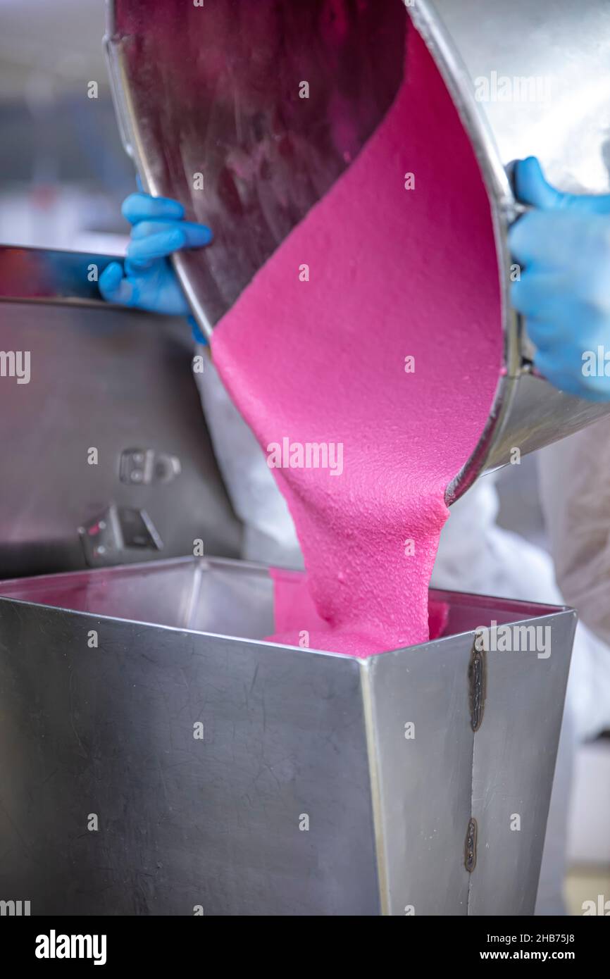Production of macarons. Preparation of pink dough. Pink Buttercream