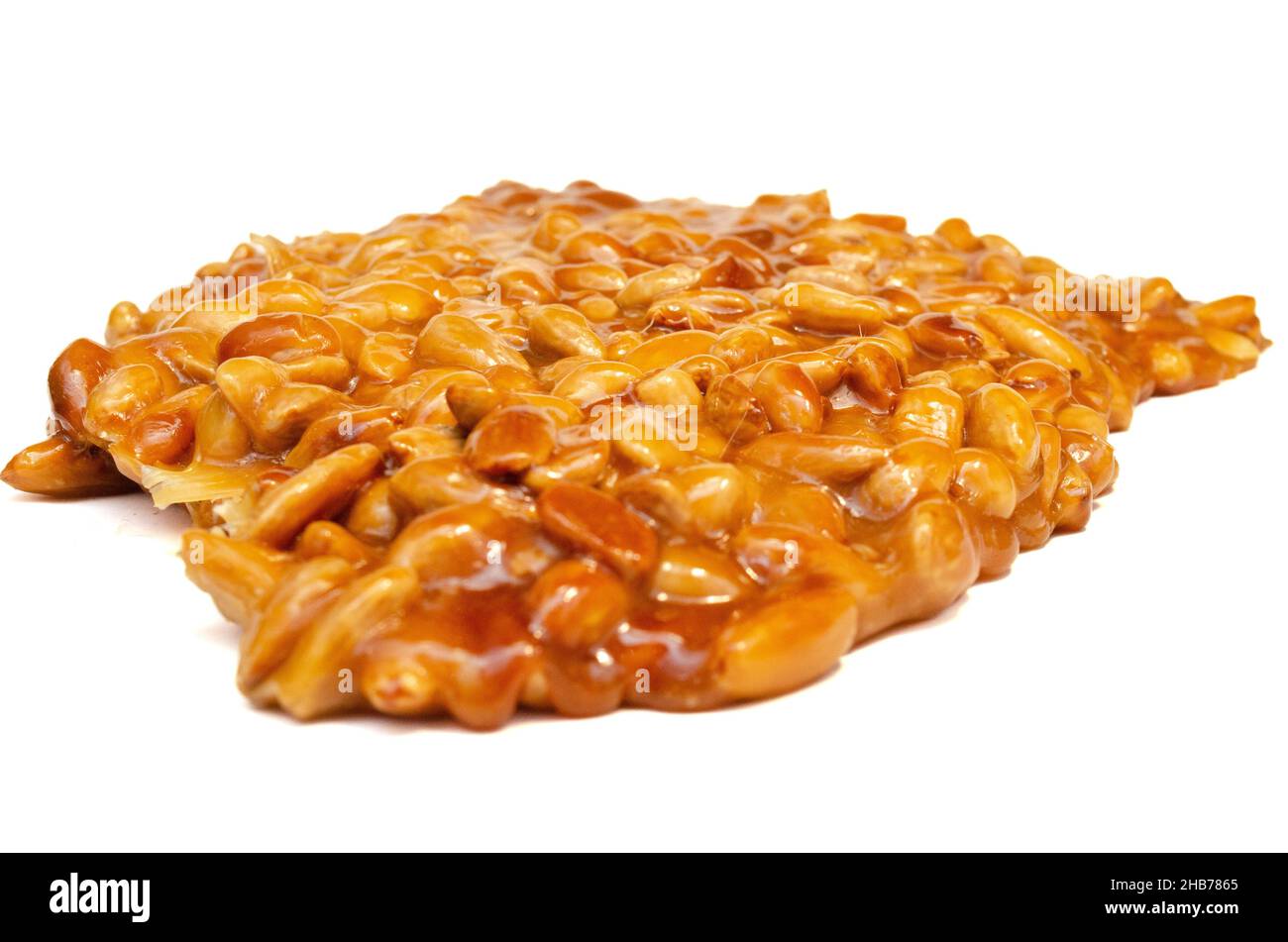 almonds caramelized prepare on restaurant kitchen isolate on white Stock Photo