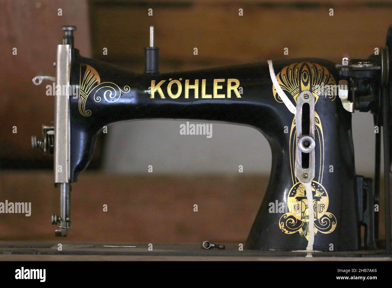 ALTENBURG, GERMANY - Dec 07, 2021: koehler sewing machines were manufactured in altenburg until the end of the second world warit is black with gold l Stock Photo