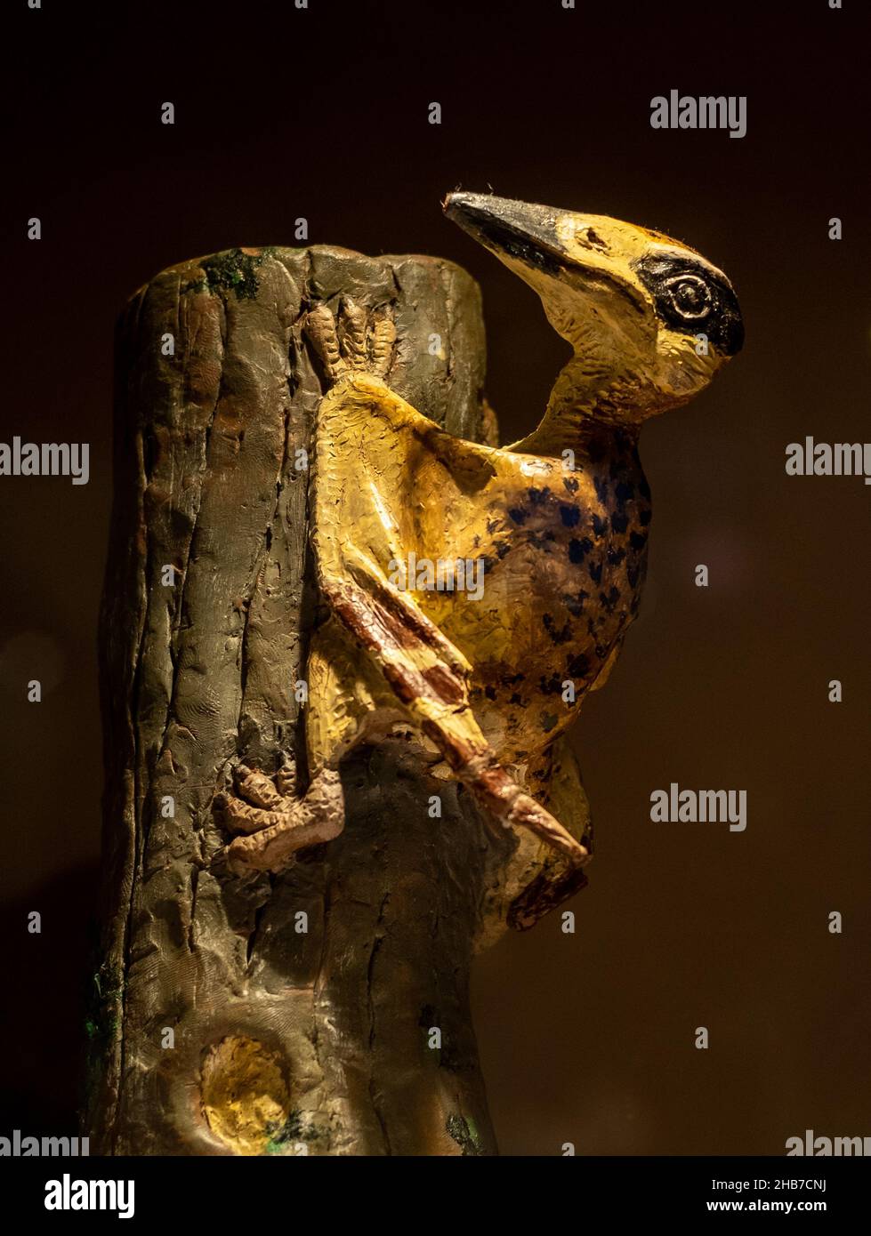Restoration sculpture of Nemicolopterus crypticus (hidden flying forest dweller). Stock Photo