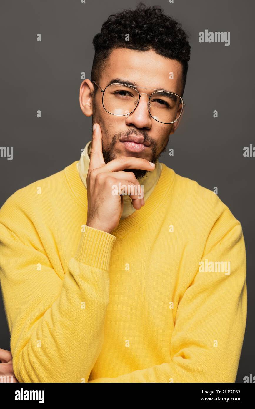 African man glasses serious isolated hi-res stock photography and ...
