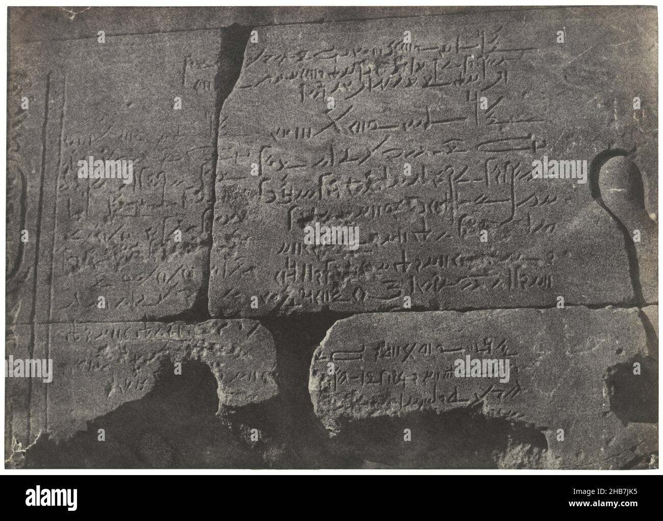 Demotic inscription in the Isis temple at Philae, Nubia. Grand Temple d'Isis, A Philoe. Inscription démotique, Egypt, Nubie, Palestine et Syrie. Dessins photographiques (series title), Maxime Du Camp, (mentioned on object), printer: Louis-Désiré Blanquart-Evrard, (mentioned on object), Philae, printer: Lille, publisher: Paris, Edinburgh, 1849 - 1851 and, or 1852, paper, cardboard, salted paper print, height 161 mm × width 225 mm, height 312 mm × width 448 mm Stock Photo