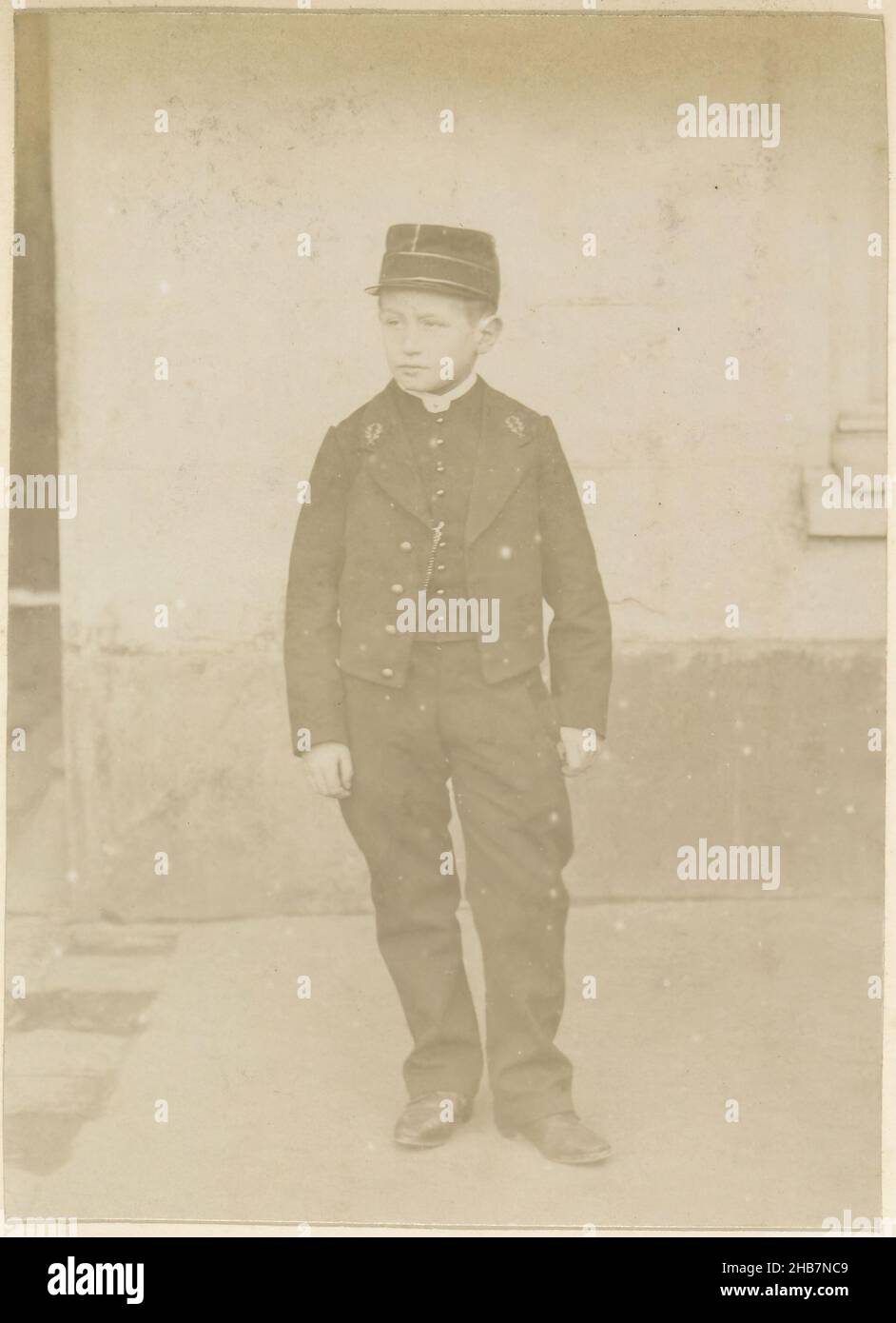 Portrait of a French boy in a uniform, Part of Photo Album of a French amateur photographer with shots of a family, distillery Delizy &amp; Doistau Fils, the army and places of interest in France., anonymous, France, c. 1900 - c. 1910, paper, albumen print, height 162 mm × width 113 mm Stock Photo