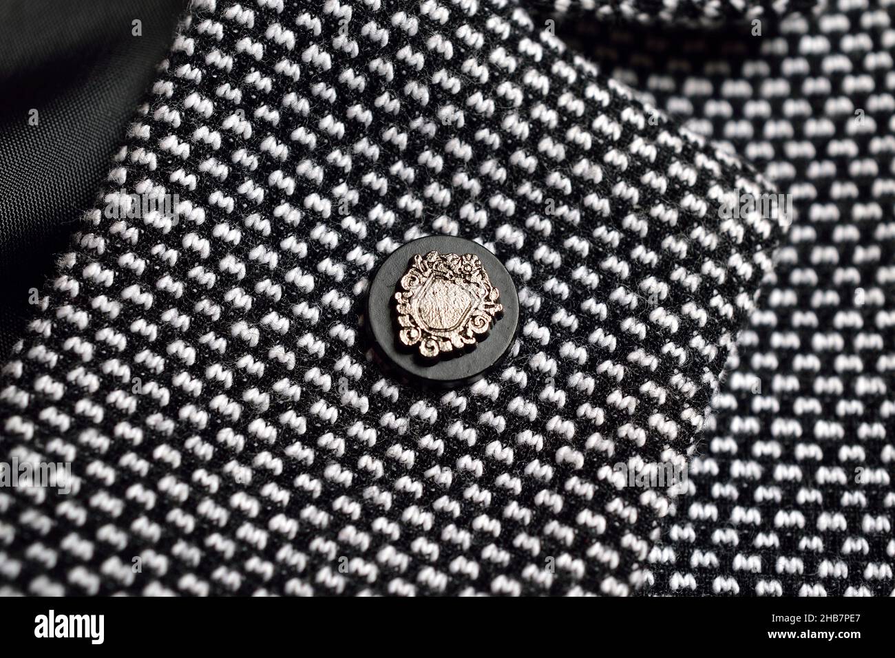 Closeup of Lapel Pin on Blazer Stock Photo