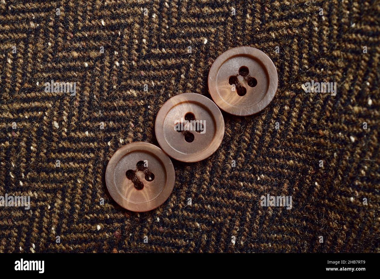 Button of herringbone fabric cloth Stock Photo