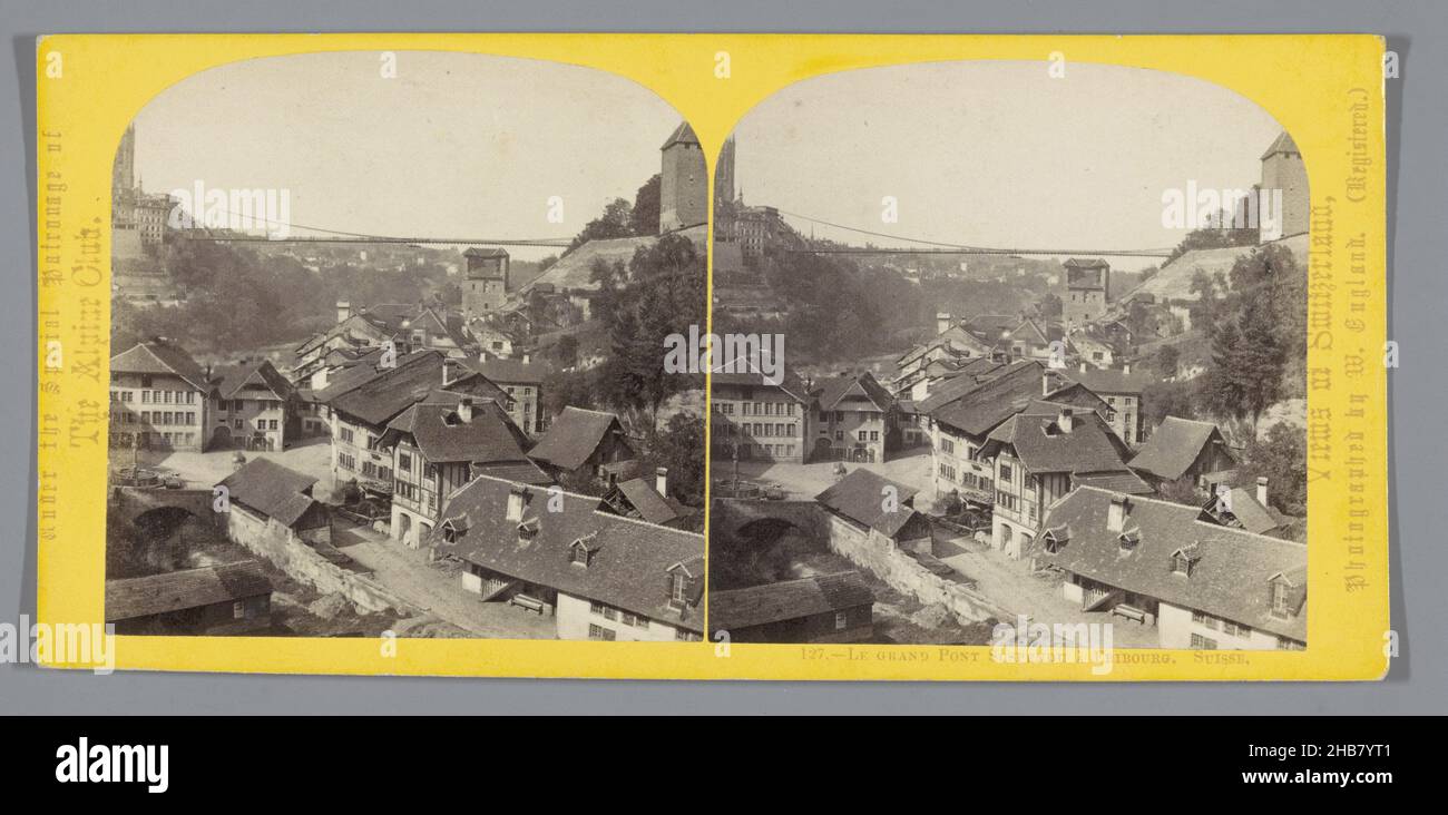 View of Fribourg, with the Gottéron Bridge in the background, Le grand Pont Suspendu à Fribourg. Suisse. (title on object), William England (mentioned on object), Fribourg, c. 1850 - c. 1880, cardboard, albumen print, height 85 mm × width 170 mm Stock Photo