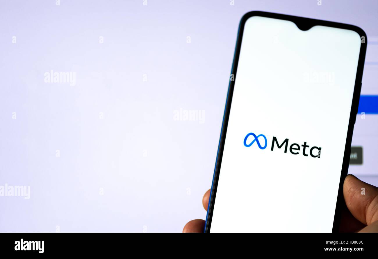 Meta Platform on the smartphone with white screen on background, American multinational technology conglomerate Stock Photo