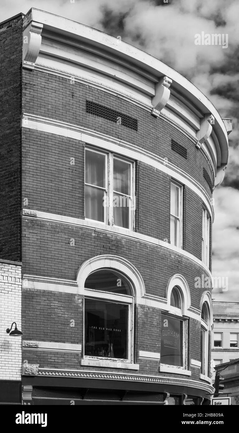 Vertical grayscale shot of the building facade Stock Photo - Alamy