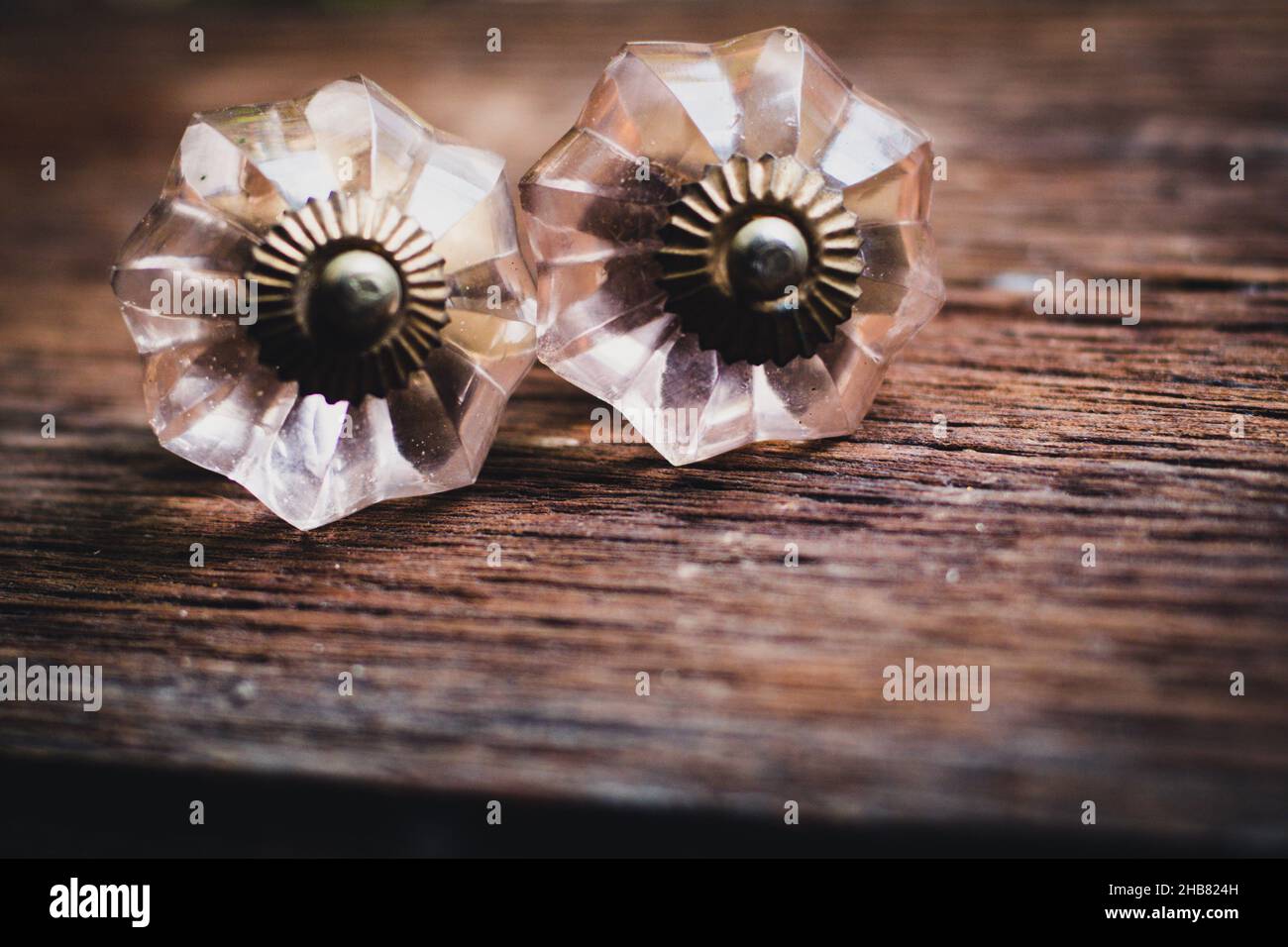 Vintage Glass Drawer Pulls, Knobs for Dresser or Antique Brass Handle Stock  Photo - Alamy