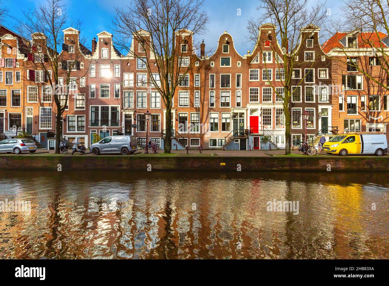 Sunny Amsterdam canal Leidsegracht with typical dutch houses, Holland, Netherlands. Stock Photo