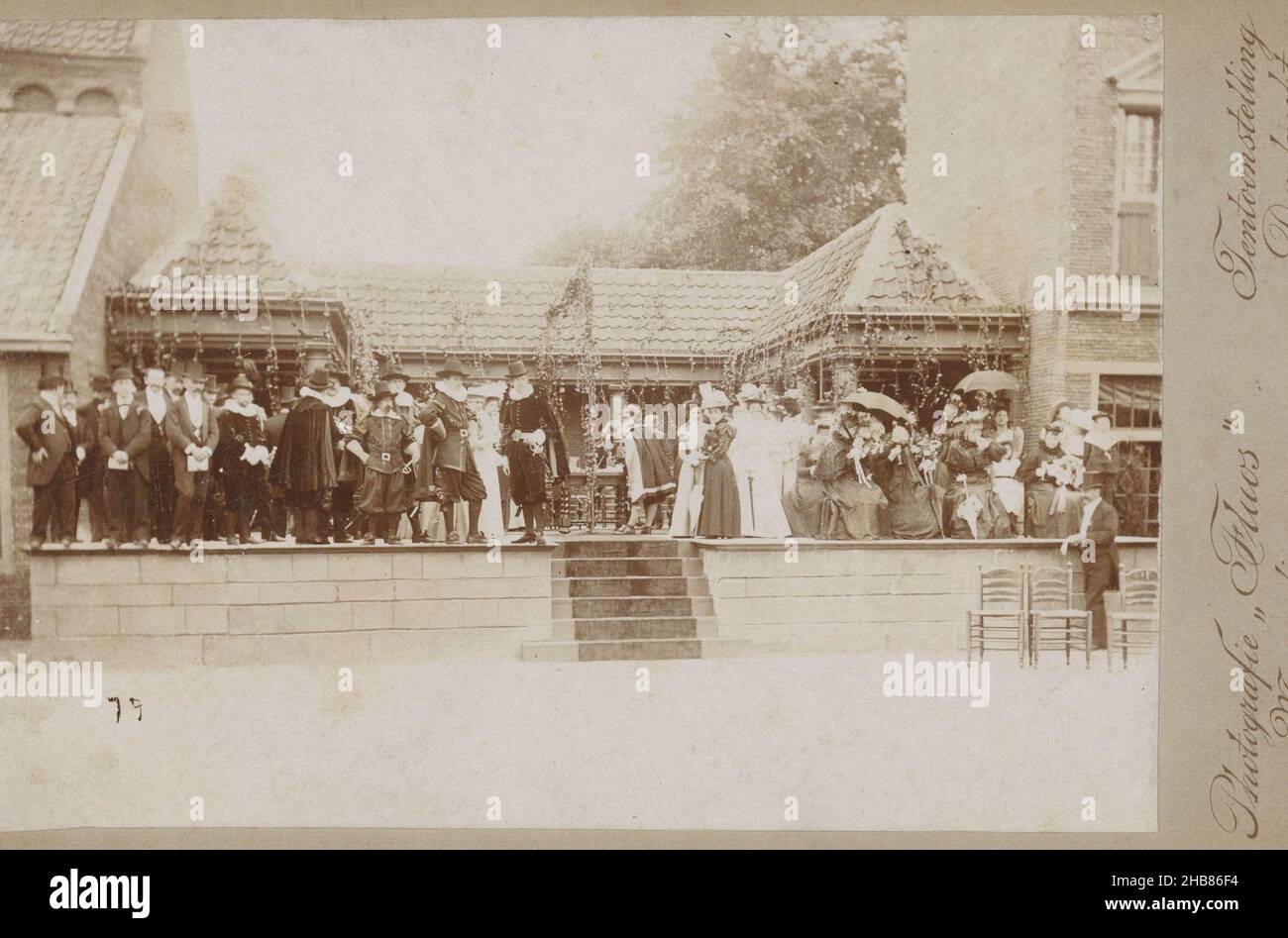 Group of people in seventeenth-century clothing on a stage during the 1897 Trade and Art Exhibition in Dordrecht, Dirk Gerardus Schnabel (mentioned on object), Dordrecht, 1897, photographic support, cardboard, height 108 mm × width 167 mm Stock Photo