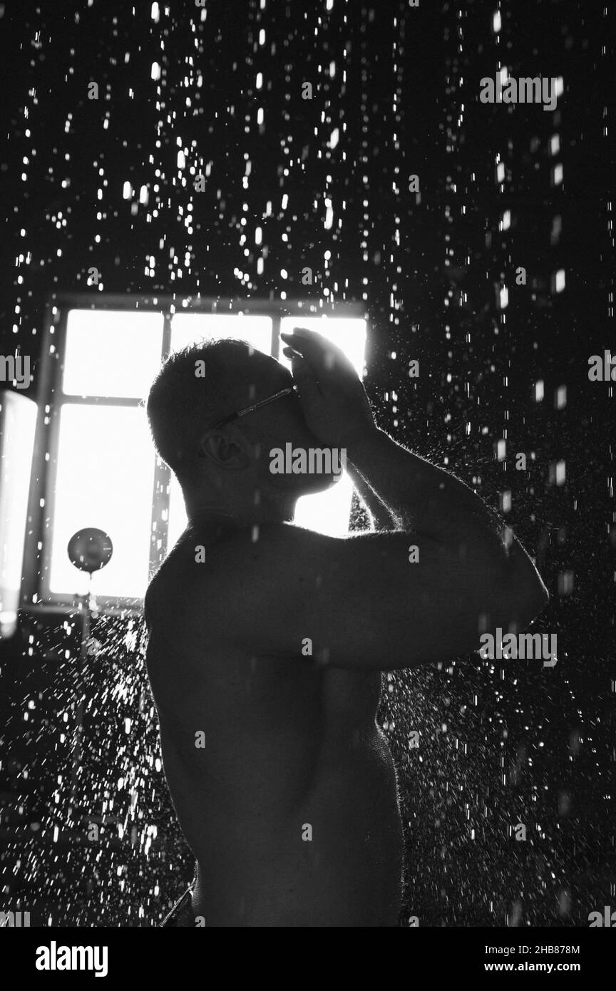 Handsome muscular man in shower. Individuality Stock Photo Alamy
