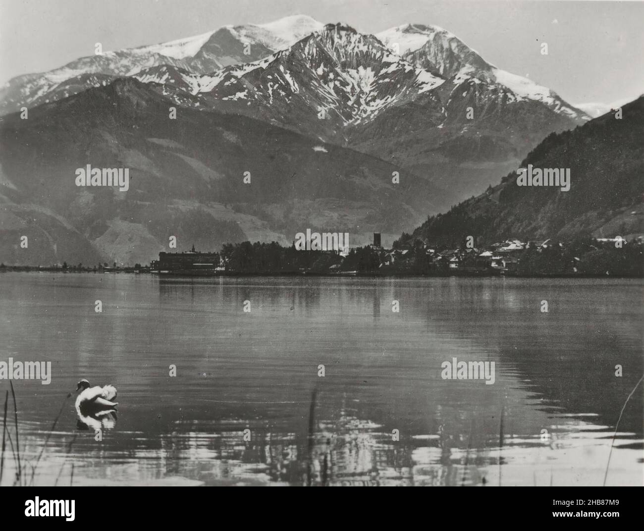 View of Zell am See, the Zeller See and the Hoher Tenn, anonymous, publisher: C.J.S. (mentioned on object), Zell am See, publisher: Salzburg, c. 1950 - c. 1960, photographic support, gelatin silver print, height 62 mm × width 82 mm Stock Photo