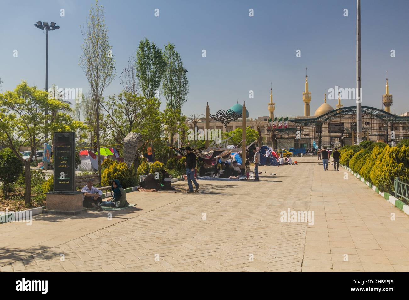 TEHRAN, IRAN - APRIL 2, 2018: People are camping in the park around Mausoleum of Ruhollah Khomeini near Tehran during the Nowruz New Year celebrations Stock Photo