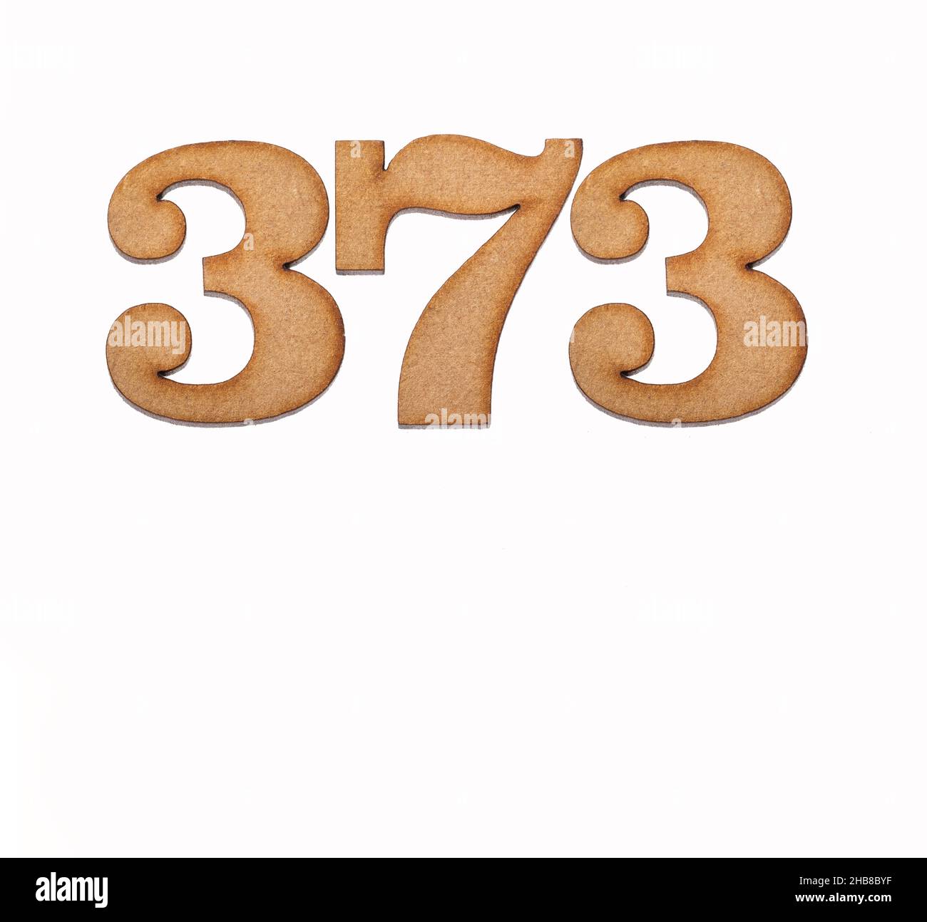 Number 373 - Piece of wood isolated on white background Stock Photo - Alamy