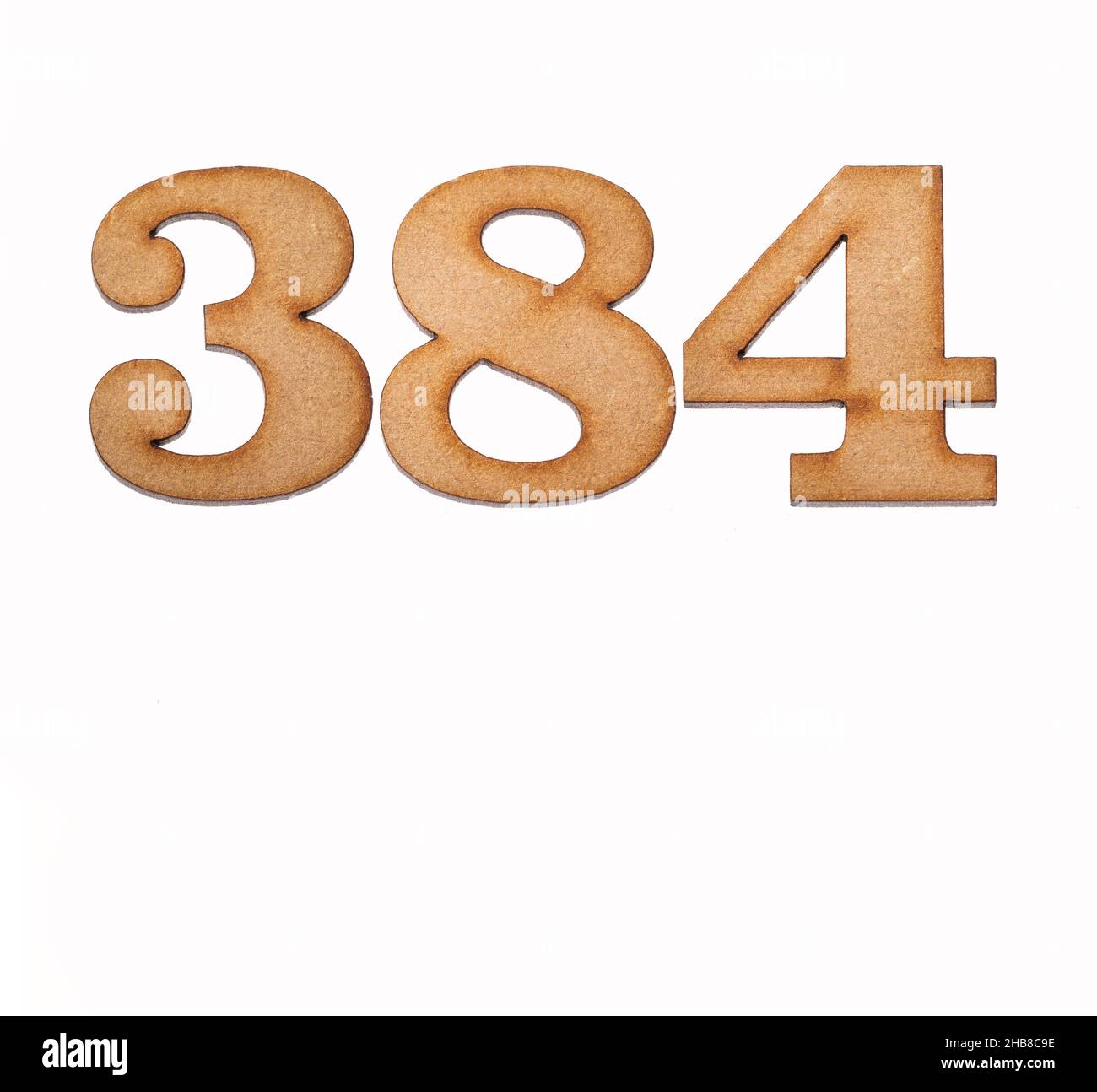 Number 384 in wood, isolated on white background Stock Photo - Alamy